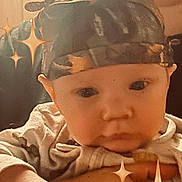 Jase Jr joined the competition — help win amazing prizes! adorable, antlers, baby, camo, child, closeup, cute, expression, face, hand, headband, heart_emoji, holding, indoors, infant, person, portrait, soft_focus, sparkles, warm_light