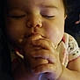 Joann is registered to the contest to win money with this photo: baby, cheek, child, chin, close_up, eating, face, finger, forehead, gesture, hand, head, lip, mouth, nose, photography, skin, smile, toddler