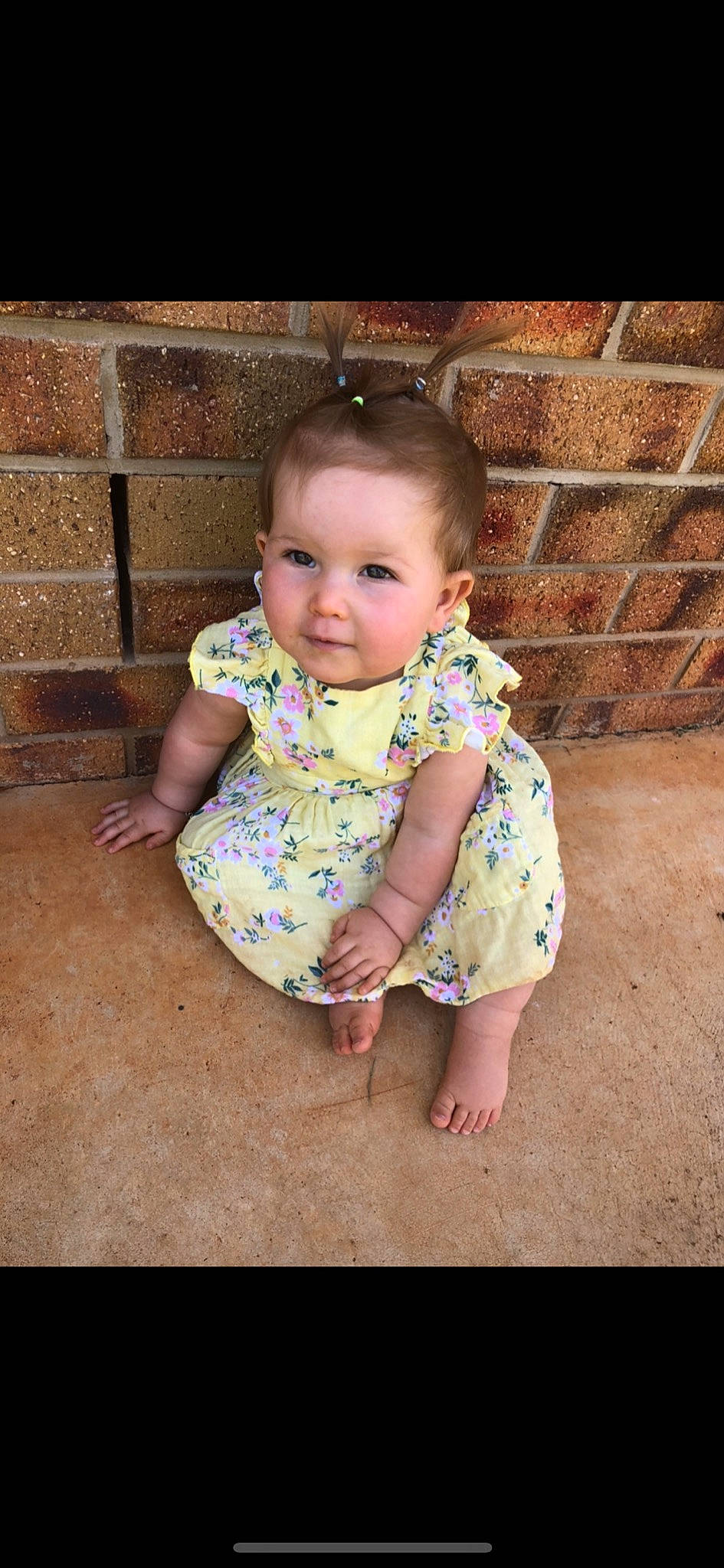 Bridie is registered to the contest to win money with this photo: baby, baby_toddler_clothing, cheek, child, pattern, person, photography, play, sitting, skin, smile, toddler