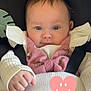 Mabel is registered to the contest to win money with this photo: baby, infant, child, face, eyes, clothing, knitted, pink, white, blanket, smile, cute, portrait, indoors, seated, closeup, expression, ribbons, hands, soft