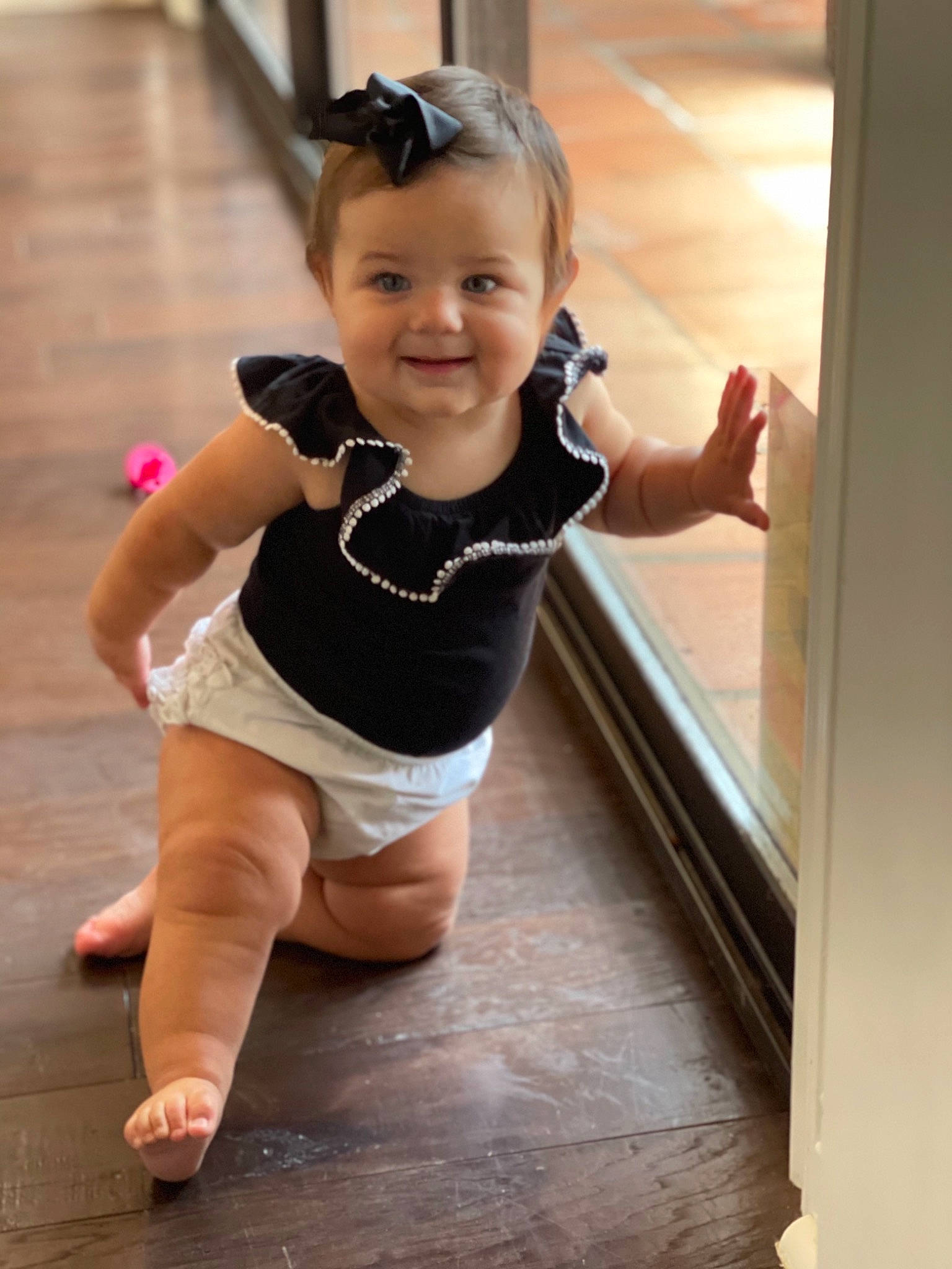 Carolina joined the competition — help win amazing prizes! baby_toddler_clothing, barefoot, finger, flooring, fun, gesture, happy, hardwood, human_leg, joy, person, shoulder, skin, sleeve, smile, sportswear, thigh, thumb, toddler, trunk