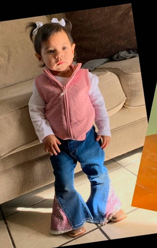 Daisy is registered to the contest to win money with this photo: baby_toddler_clothing, cheek, child, comfort, denim, fashion_design, fun, hairstyle, head, human_body, human_leg, knee, person, room, shoulder, sitting, sleeve, stairs, toddler, waist