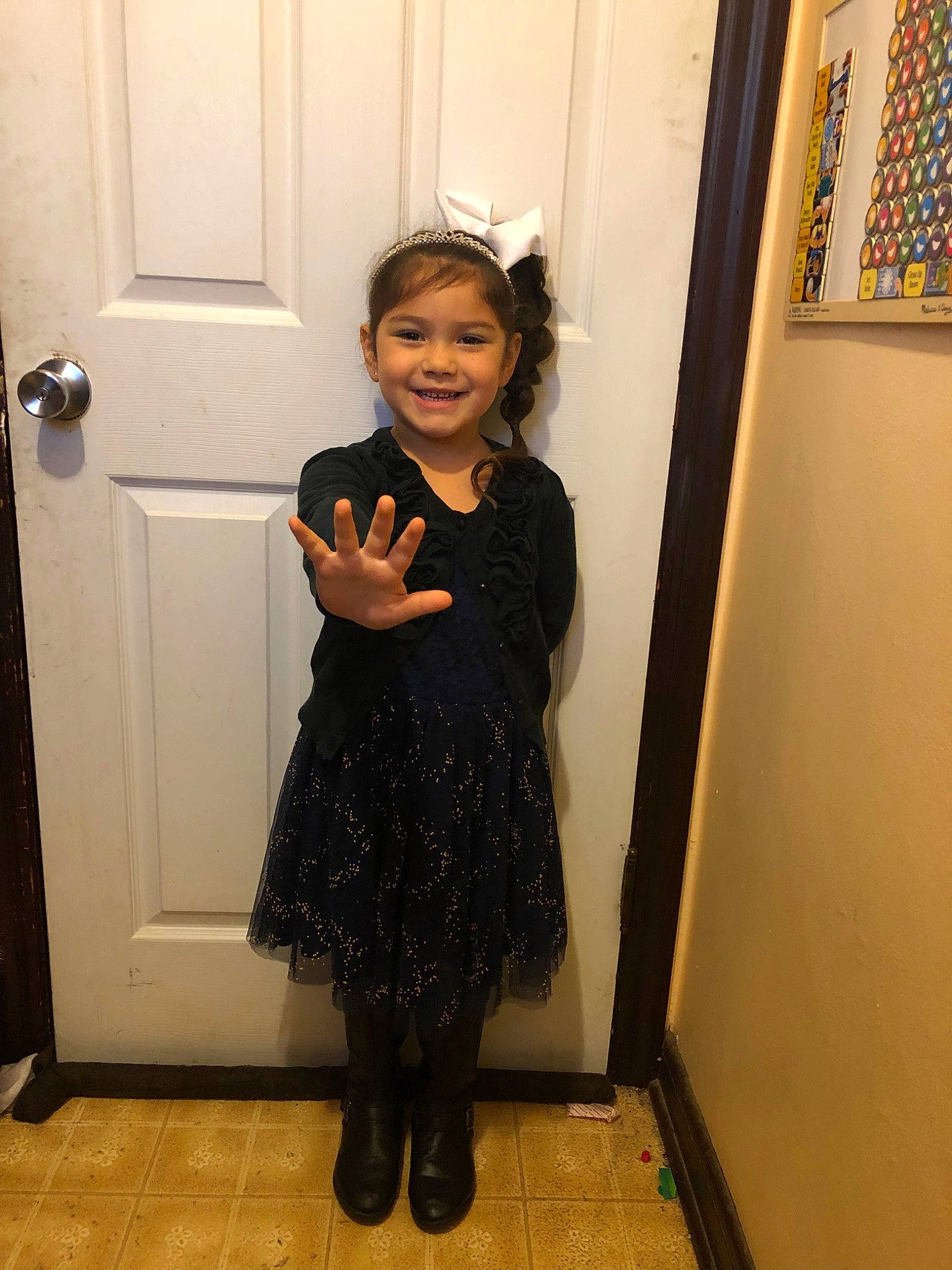 Leilani joined the competition — help win amazing prizes! child, clothing, costume, dress, formal_wear, joy, little_black_dress, person, room, smile, standing, tights, toddler