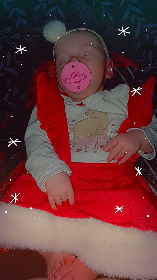 Novalie joined the competition — help win amazing prizes! baby, baby_toddler_clothing, baseball_cap, cap, carmine, child, event, fun, happy, hat, knee, lap, magenta, person, pink, red, sitting, sleeve, t_shirt, thigh