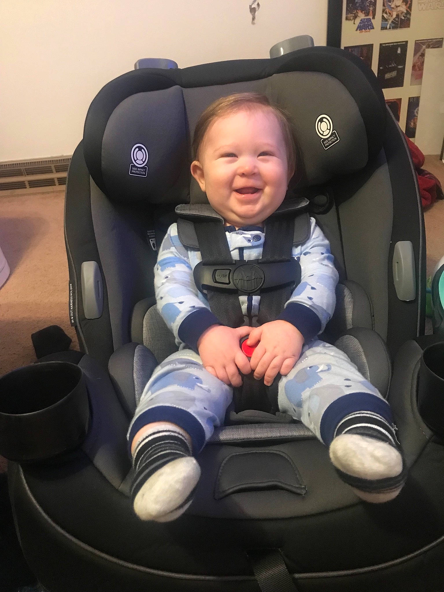 Jayse is registered to the contest to win money with this photo: baby, baby_carriage, baby_in_car_seat, car, car_seat, car_seat_cover, child, comfort, head_restraint, joy, person, product, sitting, smile, toddler, vehicle