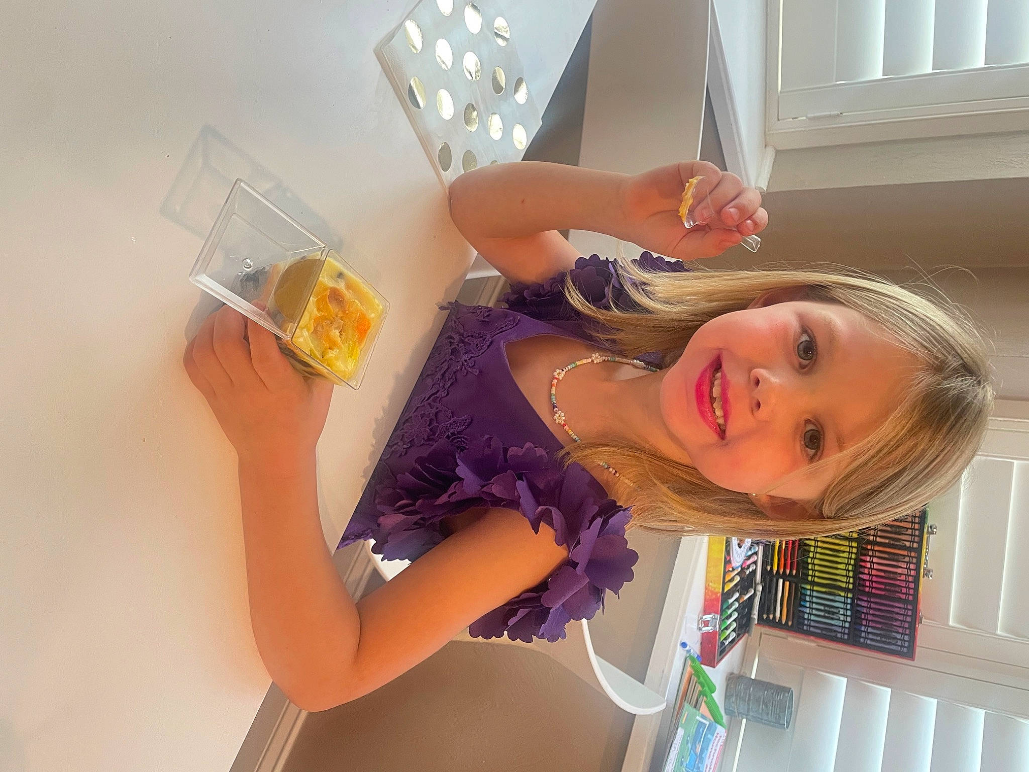 Madalynn is registered to the contest to win money with this photo: blond, child, drink, drinking, drinkware, elbow, finger, food, fun, glass, happy, human_leg, joy, knee, person, room, sitting, smile, thigh, vacation