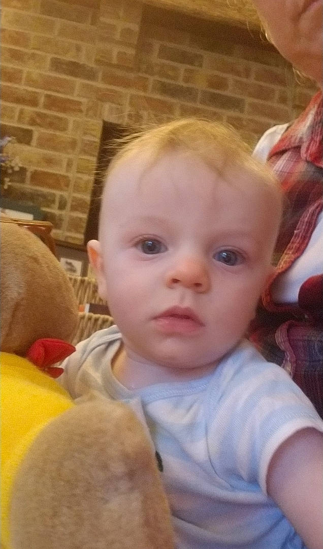 Brice is registered to the contest to win money with this photo: baby, cheek, child, chin, ear, eye, eyebrow, face, forehead, head, iris, lip, mouth, nose, person, skin, toddler