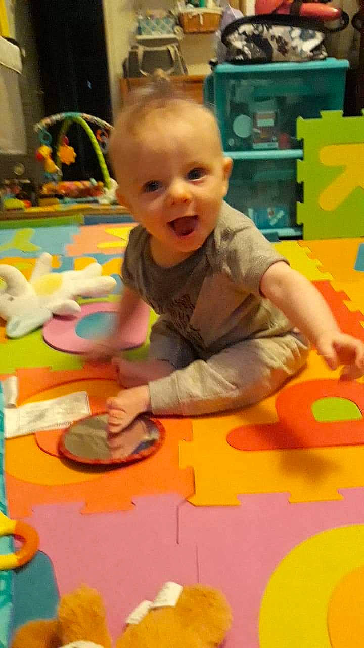 Brice is registered to the contest to win money with this photo: baby, baby_toys, child, fun, kindergarten, person, play, toddler, toy, tummy_time
