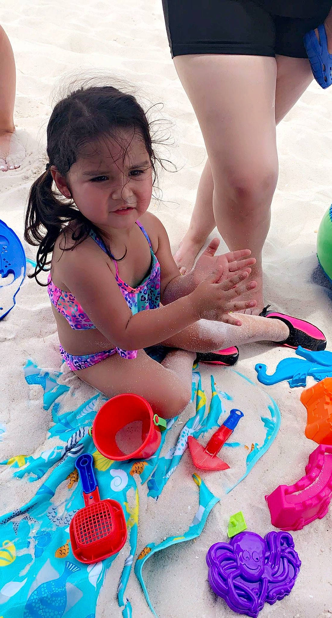 Stephanie joined the competition — help win amazing prizes! blue, child, clothing, facial_expression, fun, happy, leisure, people_on_beach, person, photograph, pink, play, product, recreation, sand, snapshot, summer, swimwear, thigh, toddler