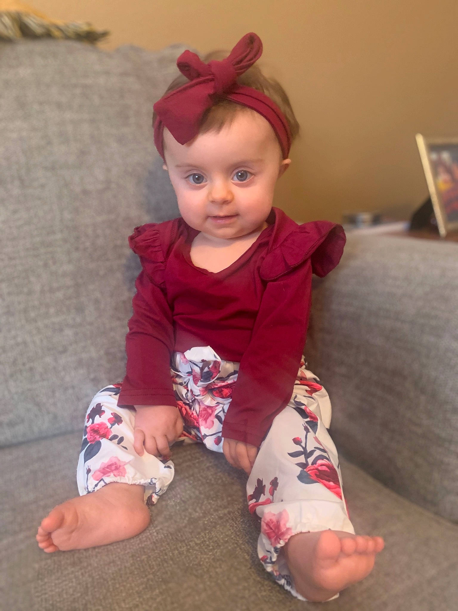 Kennedi is registered to the contest to win money with this photo: baby, baby_toddler_clothing, cheek, comfort, eye, face, floor, flooring, human_body, human_leg, joint, knee, leg, person, pink, skin, sleeve, sock, textile, thigh