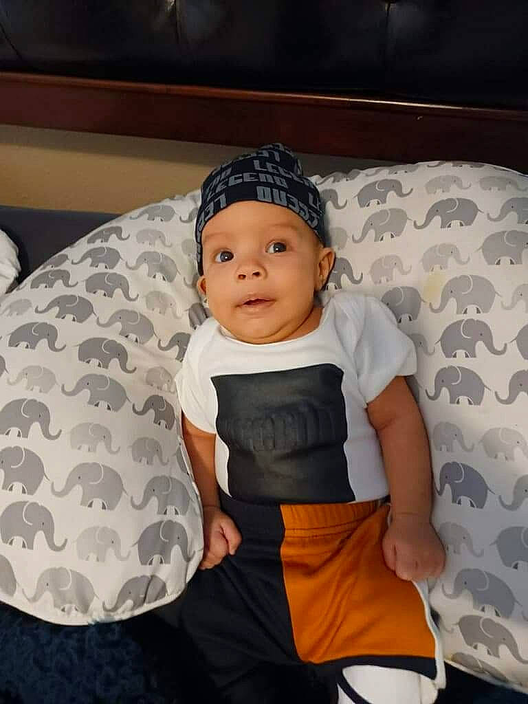 Azekiel joined the competition — help win amazing prizes! baby, baby_products, baby_toddler_clothing, cap, child, comfort, cool, eye, face, facial_expression, hat, head, headwear, linens, pattern, person, shorts, sitting, sleeve, t_shirt