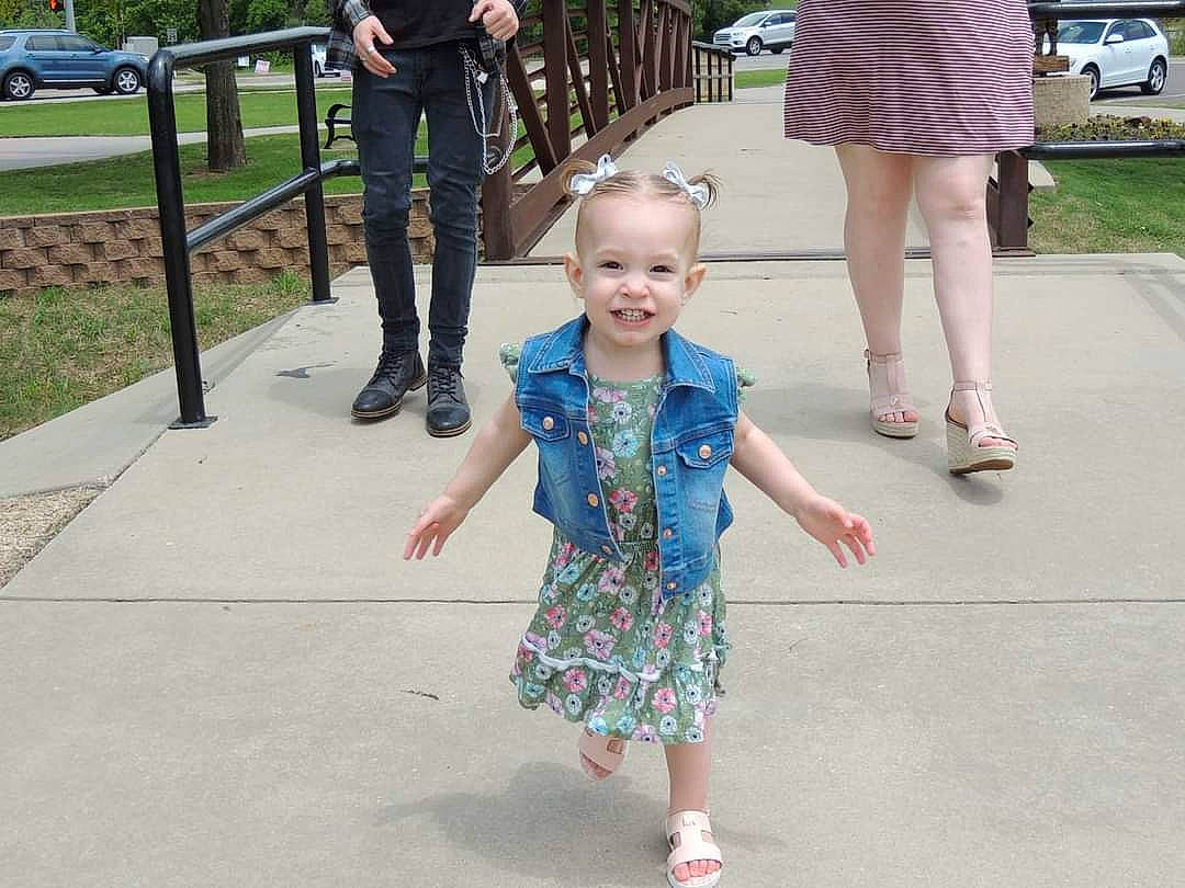 Kyera joined the competition — help win amazing prizes! event, fence, gesture, grass, happy, joint, joy, leg, leisure, people, person, pink, plant, recreation, shoe, shorts, sneakers, summer, toddler, tree