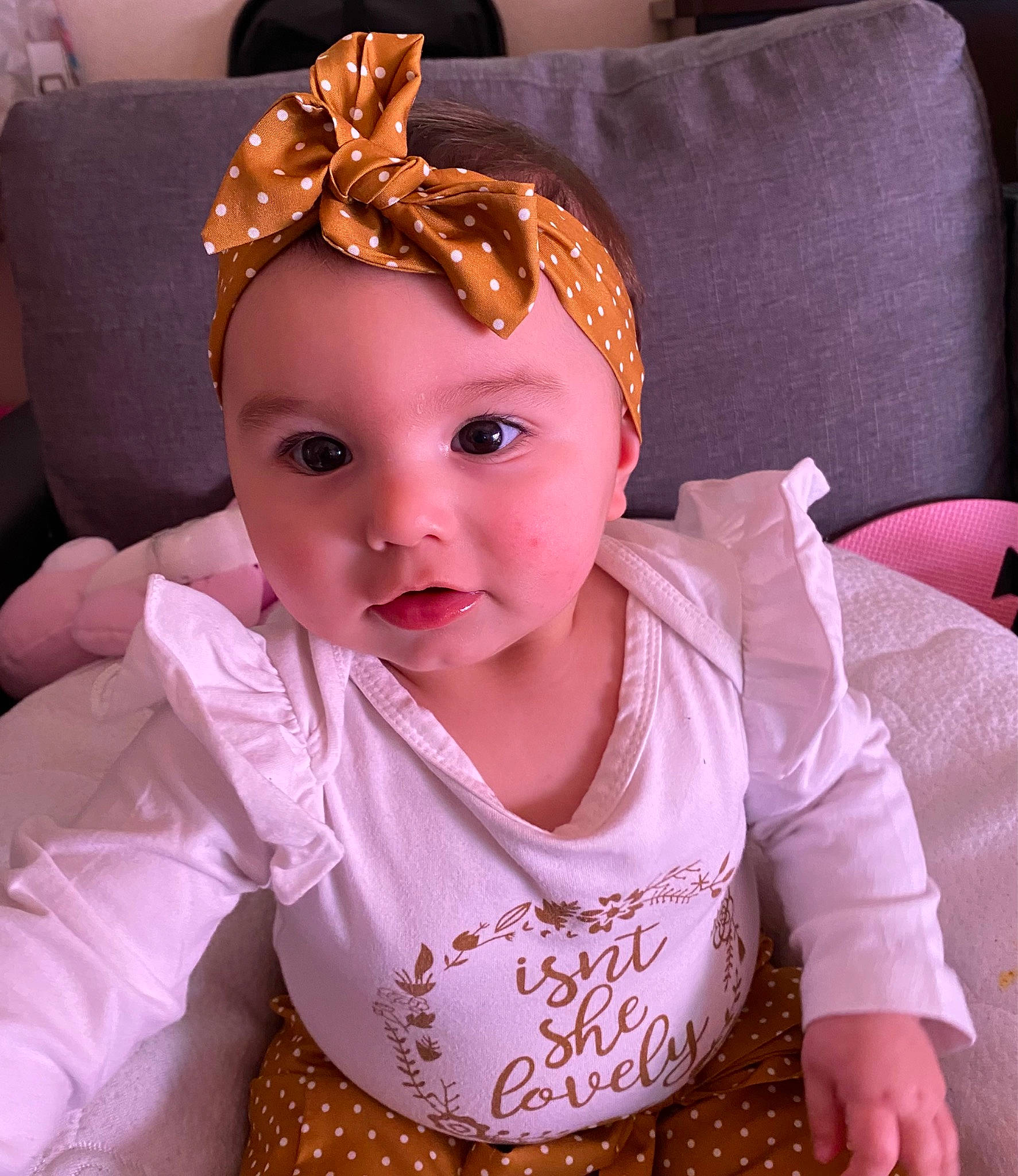 Eliana a rejoint le concours — aidez-le/la à gagner de superbes lots ! baby, baby_toddler_clothing, cap, cheek, chin, costume_hat, eye, eyebrow, eyelash, happy, head, headgear, iris, lip, neck, person, pink, purple, skin, sleeve