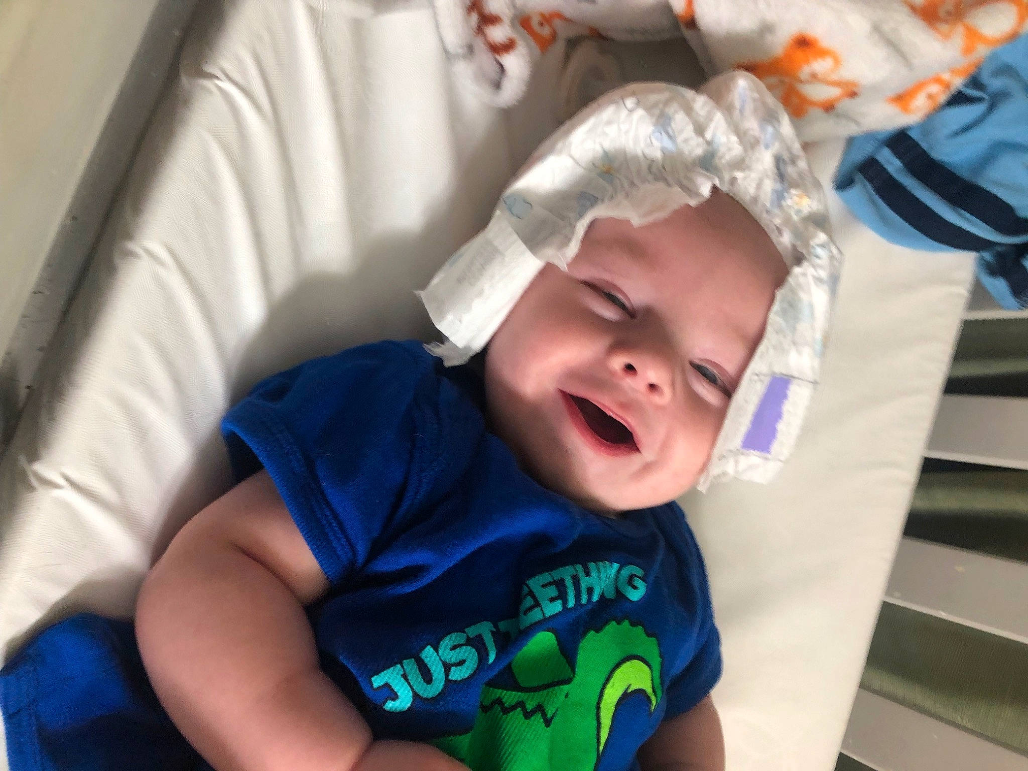 Wade joined the competition — help win amazing prizes! baby, baby_carriage, baby_products, baby_toddler_clothing, cheek, child, electric_blue, event, fashion_accessory, fun, happy, laugh, mouth, person, personal_protective_equipment, sitting, sleeve, smile, t_shirt, toddler