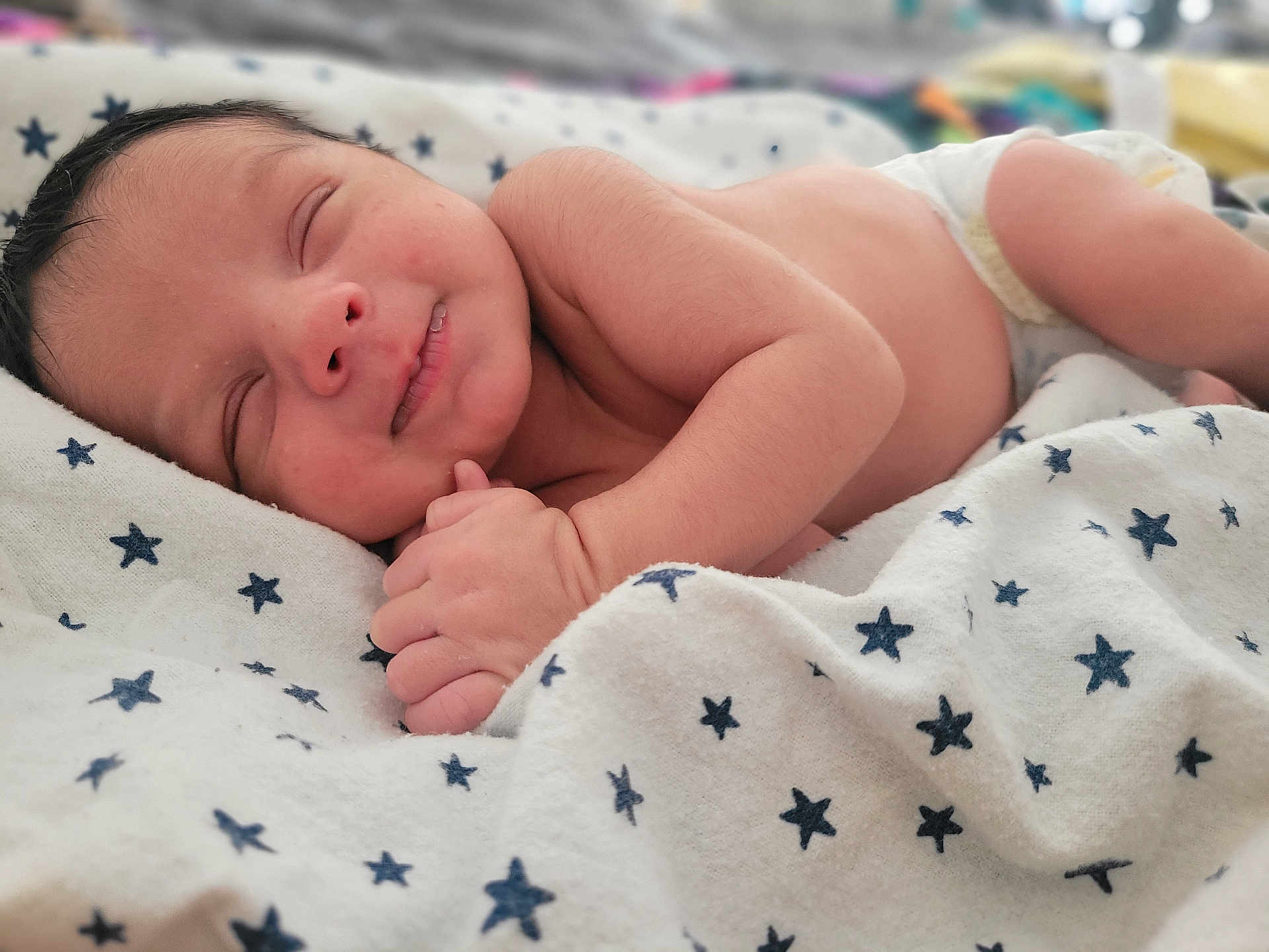 Kylin joined the competition — help win amazing prizes! newborn, baby, sleeping, smiling, blanket, stars, infant, face, hands, skin, cute, peaceful, resting, diaper, portrait, soft, closeup, cozy, child, toddler