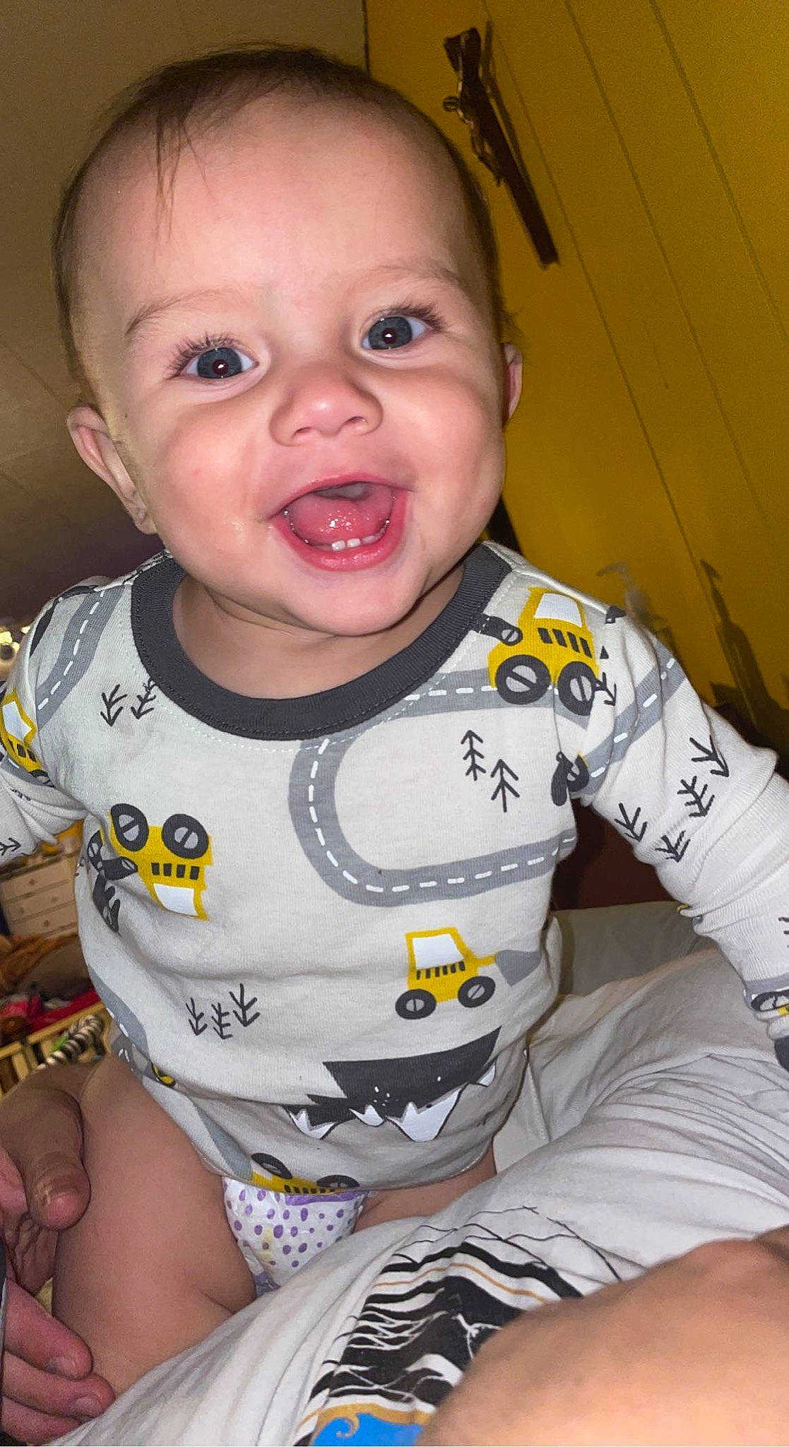 Jojo is registered to the contest to win money with this photo: baby_toddler_clothing, cheek, chin, eye, eyebrow, eyelash, facial_expression, hairstyle, head, human_body, lip, mouth, muscle, neck, nose, person, skin, sleeve, smile, sports_jersey