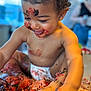 toddler, child, cake, messy, diaper, face, hands, feet, crumbs, food, indoor, playful, smiling, curly_hair, skin, sitting, closeup, colorful, fun, happy