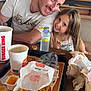 Rose a rejoint le concours — aidez-le/la à gagner de superbes lots ! man, child, smile, food, fries, drink, bottle, fast_food, burger_king, table, tray, napkin, sunglasses, restaurant, happy, meal, casual, indoor, person, eating