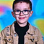 Tyler participe au concours pour gagner de l'argent avec cette photo : child, boy, glasses, smile, portrait, jacket, ripped_clothing, black_turtleneck, face, head, young, casual_wear, colorful_background, studio_photo, fashion, happy, person, eyewear, front_view, indoor