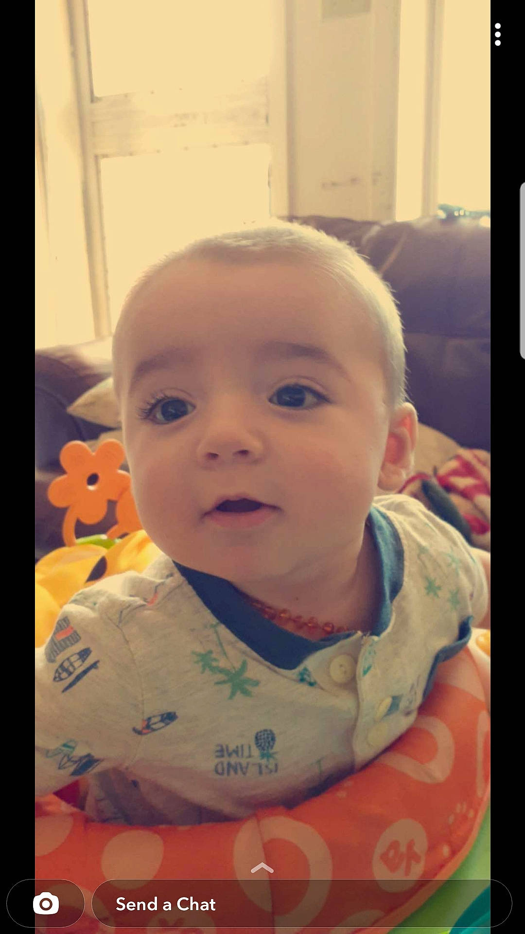 Maverick is registered to the contest to win money with this photo: baby, baby_toddler_clothing, cheek, child, cool, ear, eyebrow, eyelash, forehead, hair, hairstyle, happy, iris, lip, mouth, nose, person, skin, sleeve, smile