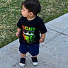 boy, casual_clothing, child, cute, daylight, feet, grass, hair, lawn, looking_away, outdoor, pavement, portrait, profile_view, shorts, sidewalk, sneakers, standing, toddler, tshirt