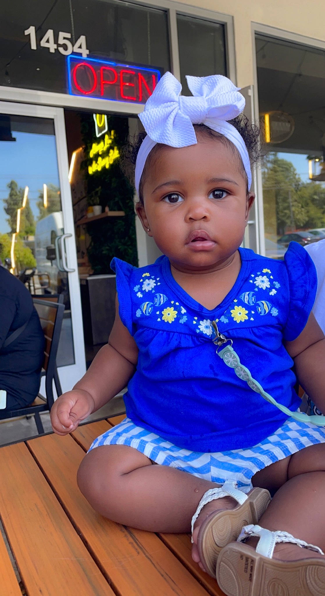 Kadence is registered to the contest to win money with this photo: baby, baby_toddler_clothing, blue, cap, chair, child, cool, costume_hat, electric_blue, event, fun, hairstyle, happy, headwear, jewellery, leisure, necklace, person, purple, skin