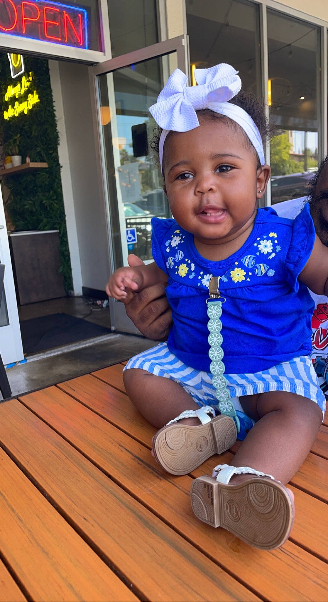 Kadence joined the competition — help win amazing prizes! baby, baby_toddler_clothing, blue, child, door, electric_blue, event, fashion_accessory, flooring, fun, happy, hardwood, hat, jewellery, leisure, necklace, person, t_shirt, toddler, wood