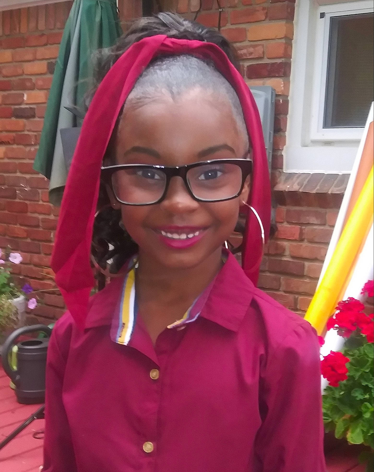 Zaya is registered to the contest to win money with this photo: face, forehead, glasses, head, joy, lady, magenta, outerwear, person, pink, smile