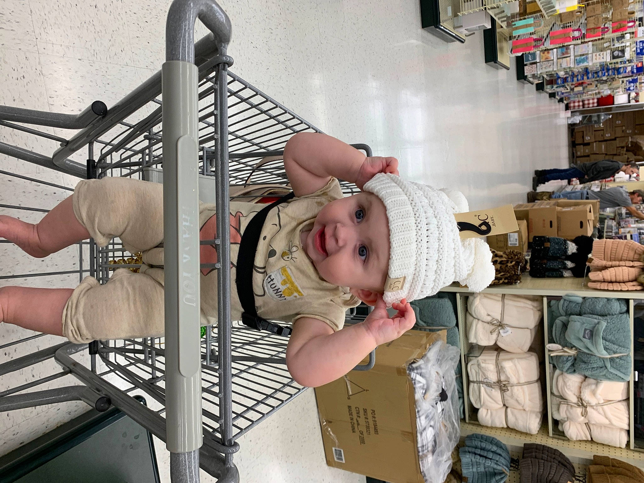 Brayleigh is registered to the contest to win money with this photo: baby, baby_products, baby_safety, baby_toddler_clothing, building, child, comfort, handrail, hat, headwear, metal, person, room, smile, toddler