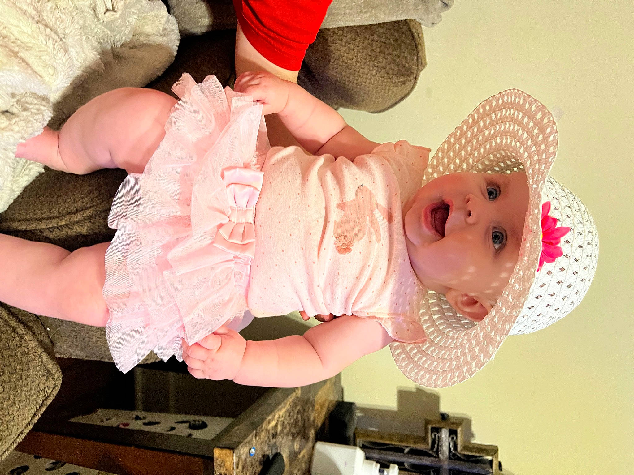 Brayleigh is registered to the contest to win money with this photo: baby, baby_products, baby_toddler_clothing, child, costume, costume_hat, fashion_accessory, fun, happy, hat, headgear, headwear, peach, person, pink, room, shorts, sun_hat, thigh, toddler