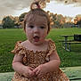 baby, child, cute, dress, expression, floral, girl, grass, green, nature, outdoor, park, picnic_table, portrait, sitting, sky, summer, sunset, toddler, tree