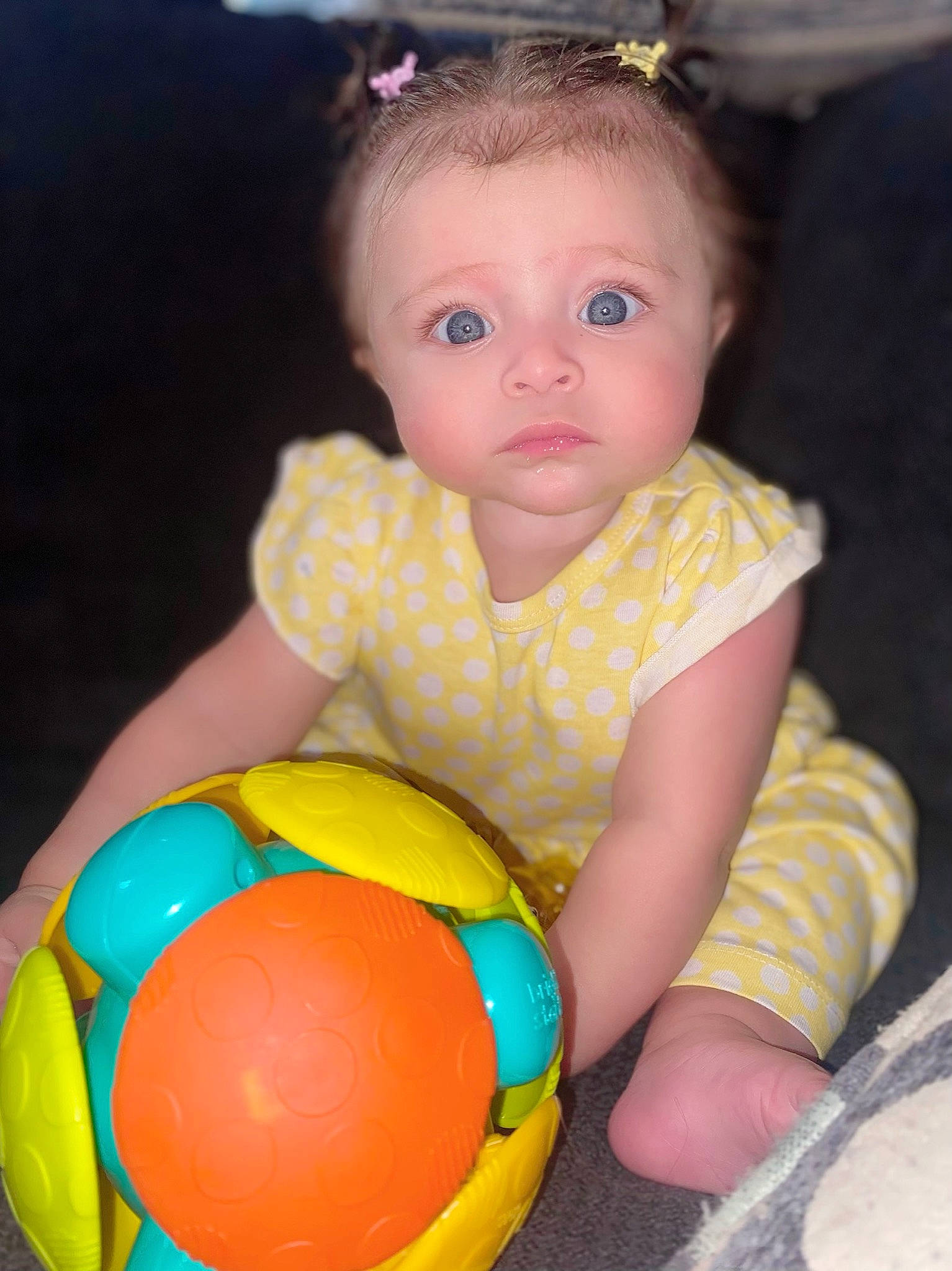 Delilah is registered to the contest to win money with this photo: arm, baby, baby_playing_with_toys, baby_toddler_clothing, beauty, cheek, child, eye, facial_expression, fun, happy, head, iris, nose, organ, person, photograph, pink, skin, toddler