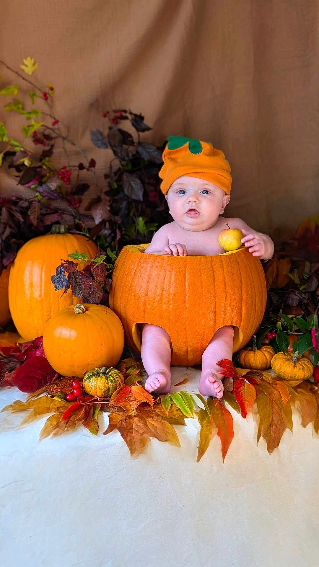Charlie is registered to the contest to win money with this photo: baby, pumpkin, fall, autumn, leaves, orange, hat, fruit, apple, cute, child, seasonal, holiday, decor, nature, harvest, sitting, portrait, smiling, festive