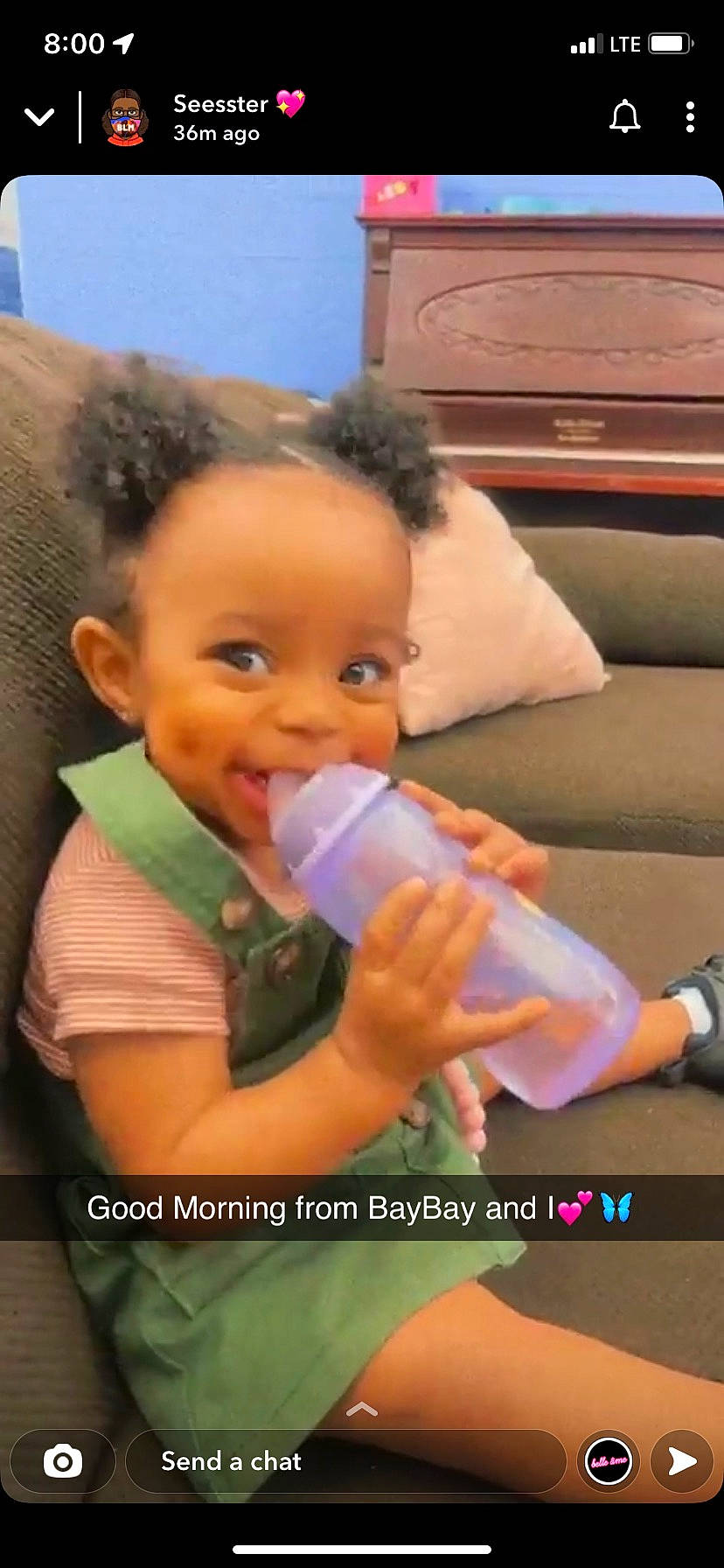 Jozie joined the competition — help win amazing prizes! baby, baby_bottle, cabinetry, cheek, child, drinkware, eyebrow, eyelash, face, finger, gesture, hand, happy, head, nose, person, plastic_bottle, skin, smile, thumb