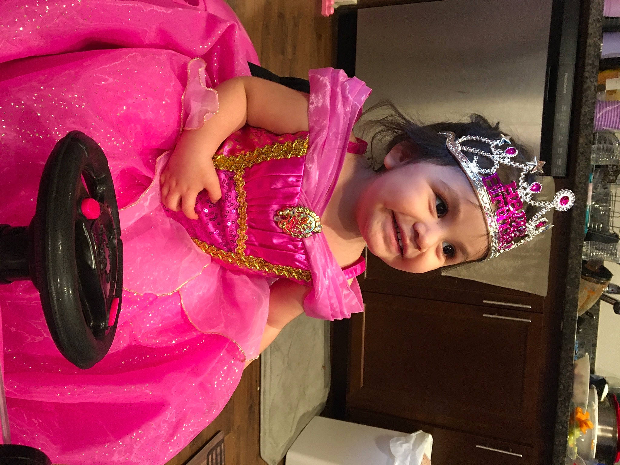 Delilah is registered to the contest to win money with this photo: beauty, black_hair, design, dress, event, eyelash, fashion, fashion_design, fun, hairstyle, headwear, joy, magenta, makeover, person, pink, purple, room, skin, textile