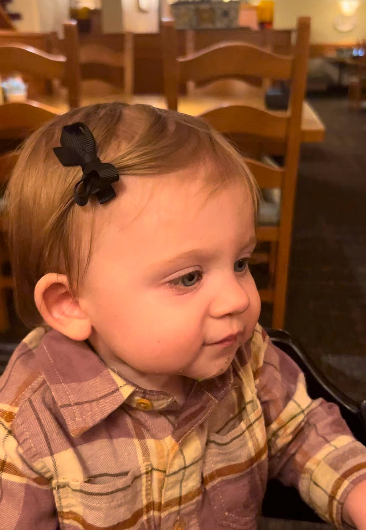 Stella is registered to the contest to win money with this photo: baby, baby_toddler_clothing, chair, cheek, child, chin, ear, eyebrow, eyelash, forehead, iris, lip, mouth, neck, nose, person, skin, sleeve, snapshot, toddler