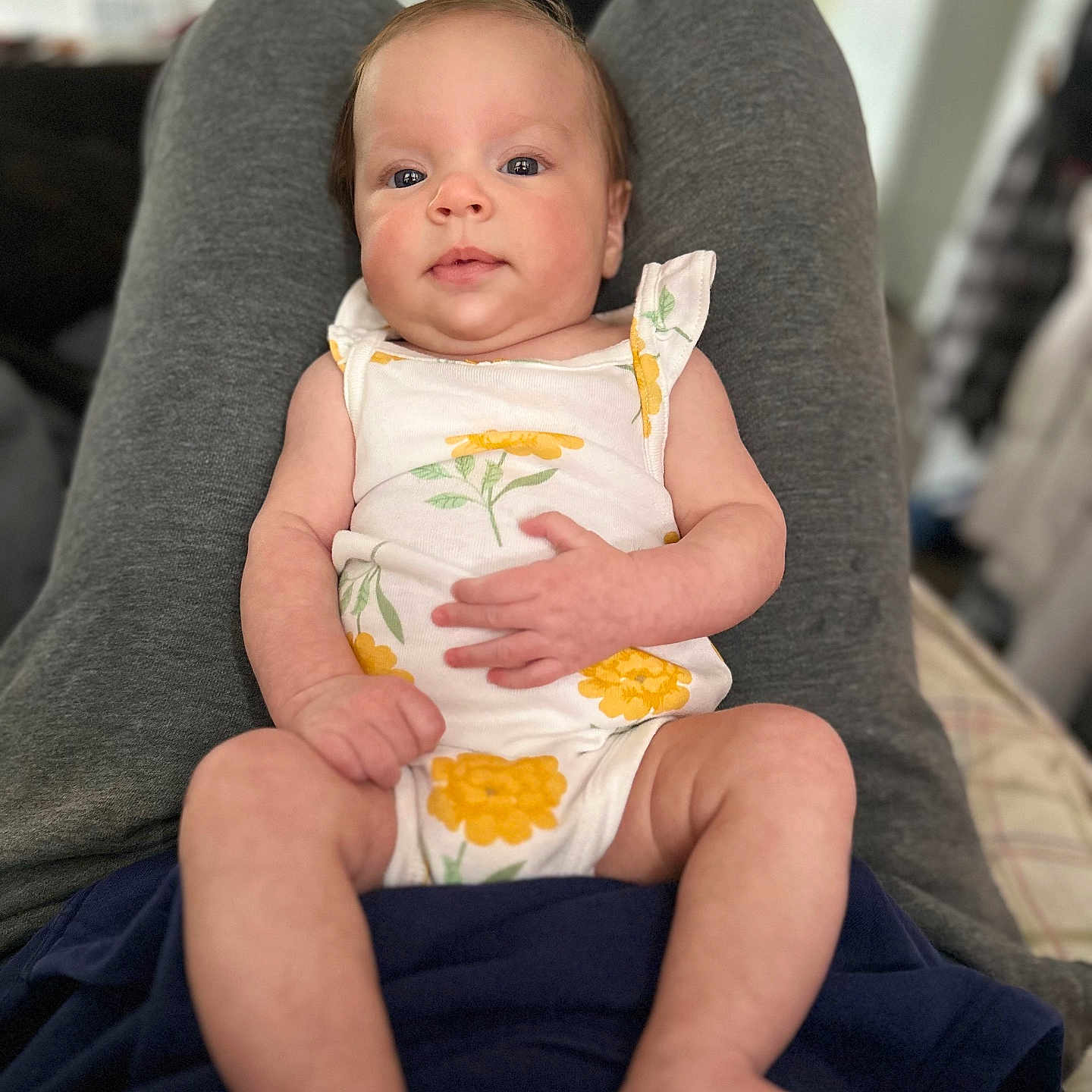 Dahlia joined the competition — help win amazing prizes! baby, bodypart, chair, clothing, couch, cushion, diaper, face, finger, furniture, hand, head, homedecor, newborn, pants, person, photography, portrait, sitting, t_shirt