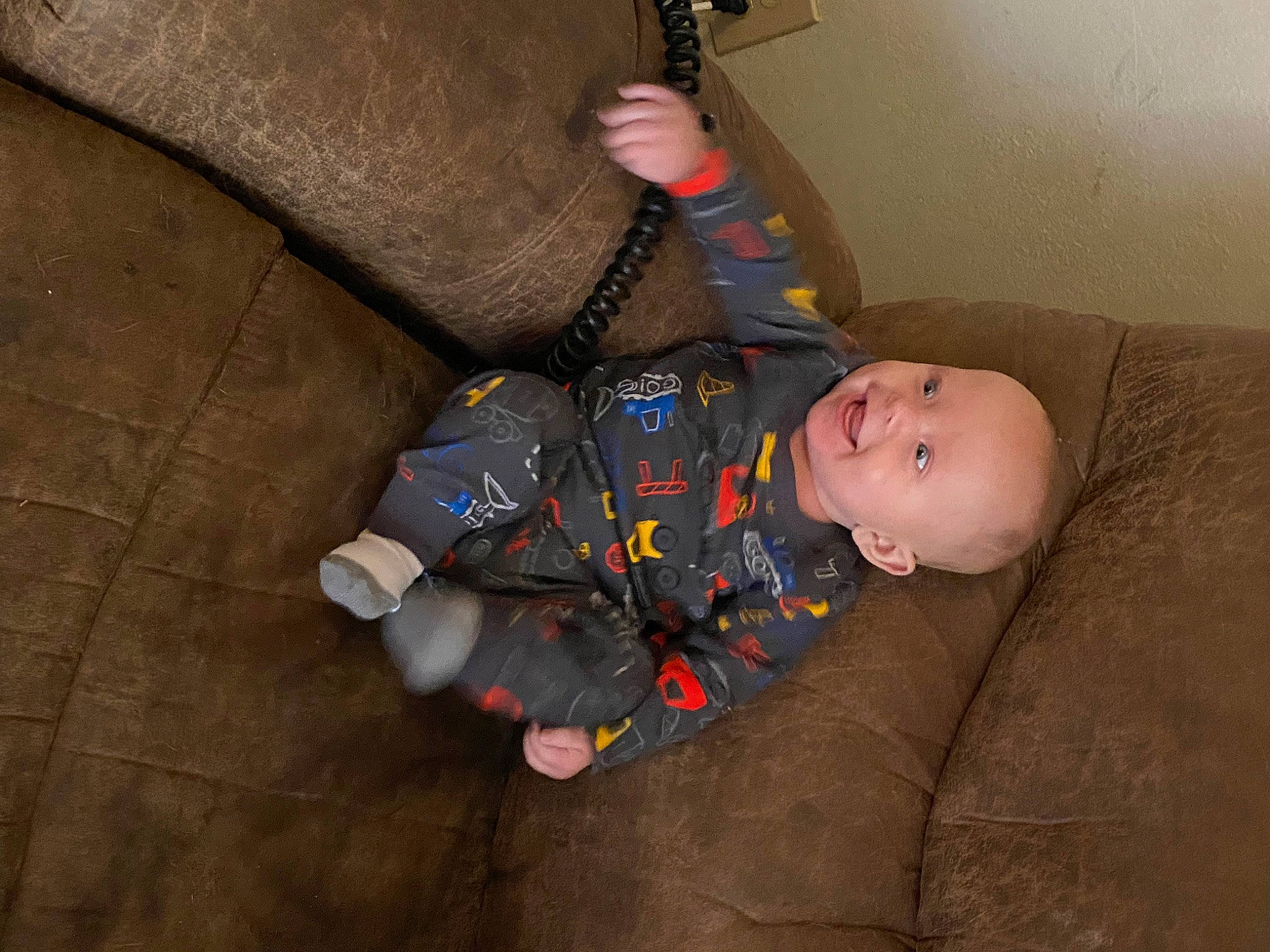 Dwayne joined the competition — help win amazing prizes! baby, baby_products, baby_toddler_clothing, child, comfort, couch, floor, flooring, fun, hardwood, person, room, sitting, toddler, wood