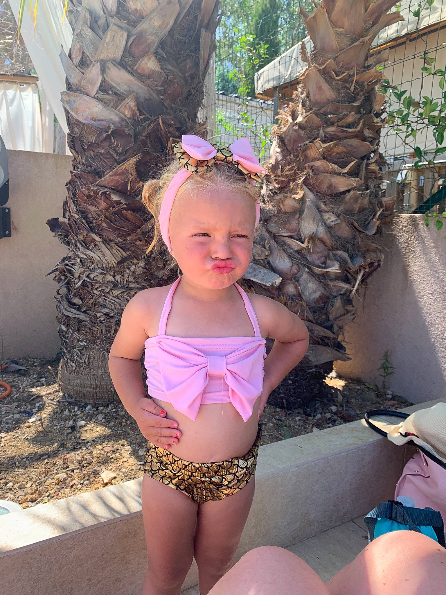 Scarlett participe au concours pour gagner de l'argent avec cette photo : abdomen, brassiere, child, child_model, clothing, fawn, leg, lingerie, person, pink, summer, swimsuit_top, swimwear, thigh, trunk, undergarment, vacation