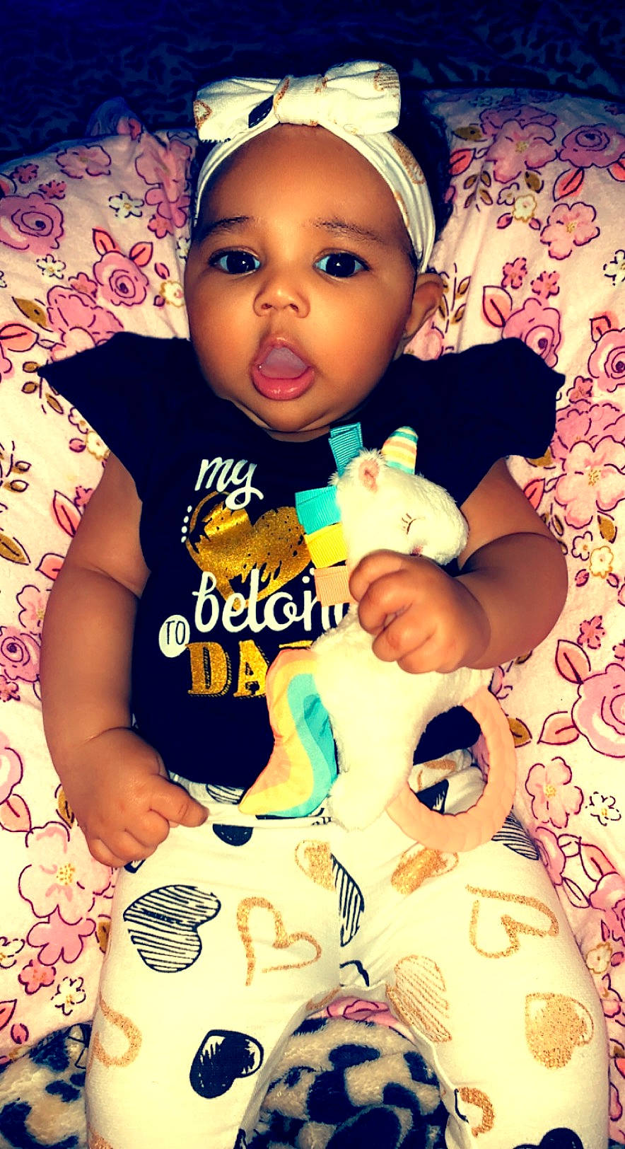 Anastasia is registered to the contest to win money with this photo: arm, baby, baby_toddler_clothing, cap, cheek, cool, facial_expression, fashion_accessory, finger, fun, happy, hat, pattern, person, pink, product, skin, sleeve, sweetness, t_shirt