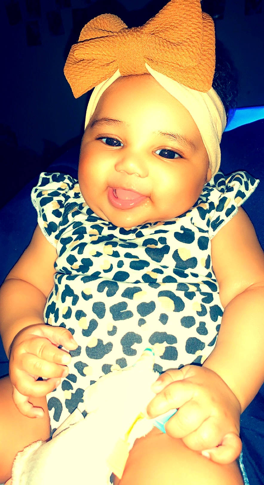 Anastasia is registered to the contest to win money with this photo: azure, baby_toddler_clothing, cap, cheek, chin, eyebrow, facial_expression, gesture, hairstyle, hand, happy, headwear, lip, nose, organ, outerwear, person, photograph, product, skin