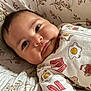 baby, bacon, bed, breakfast_theme, cheeks, clothing, cute, egg, expression, face, floral, indoors, infant, lying_down, onesie, pattern, portrait, quilt, syrup, waffle