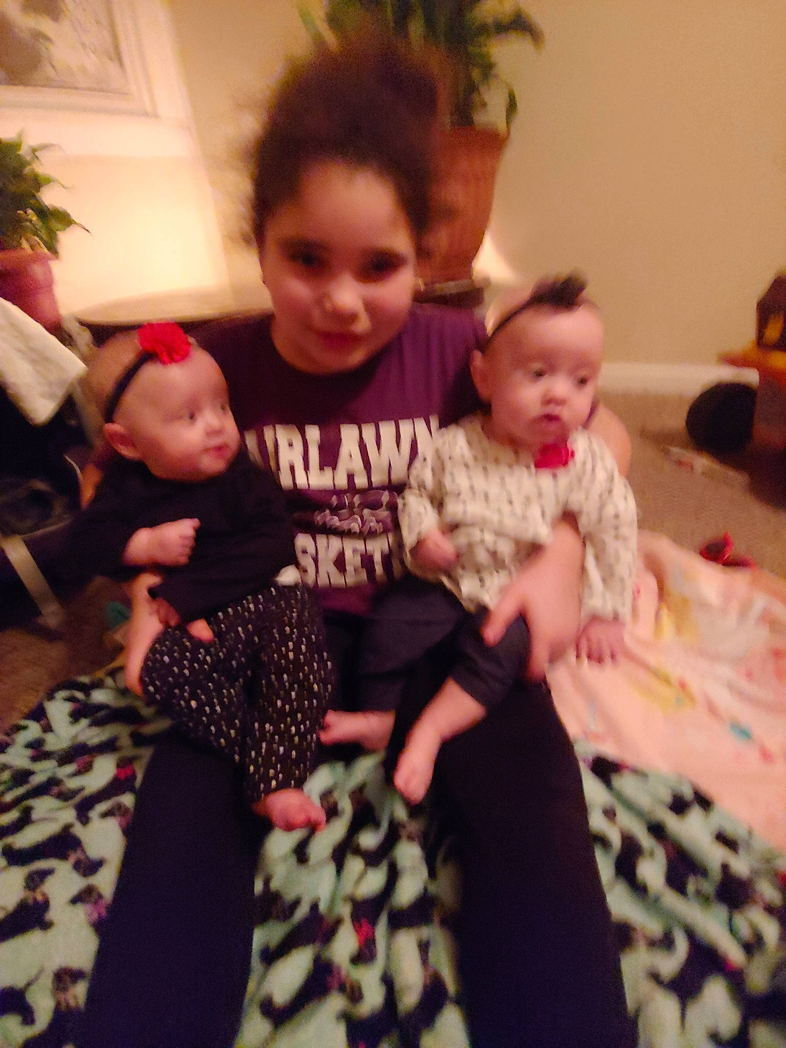 Misty is registered to the contest to win money with this photo: baby, child, christmas, daughter, ear, family, fun, head, holiday, person, room, smile, toddler