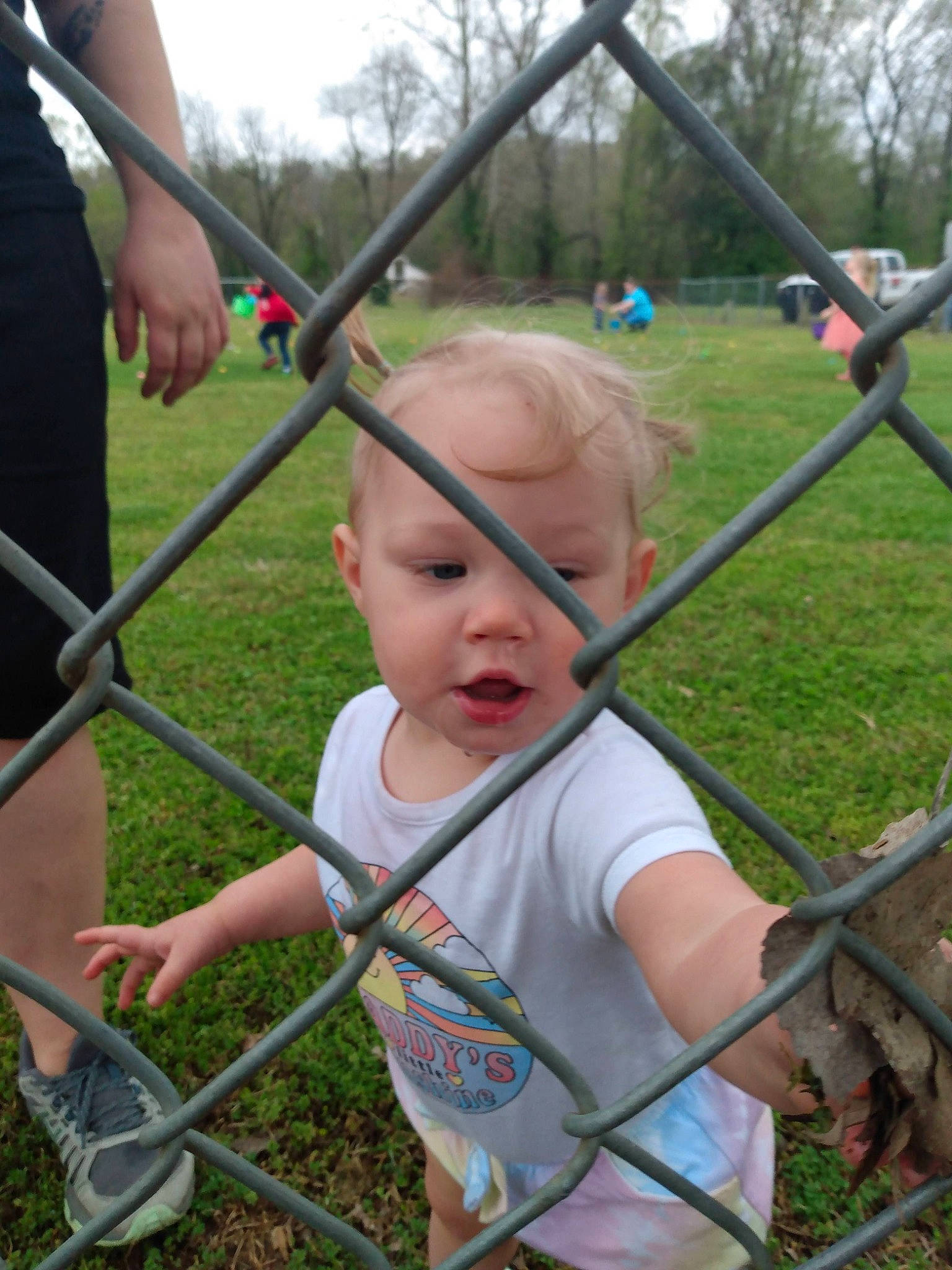 Sabriana is registered to the contest to win money with this photo: baby, child, city, fun, grass, leisure, outdoor_play_equipment, person, plant, play, playground, pole, recreation, shade, sky, swing, toddler, tree, yard
