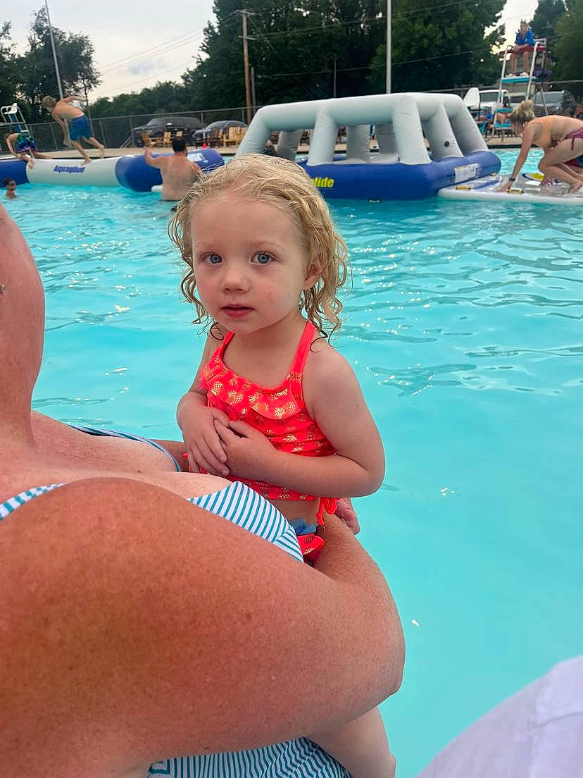 Emberleigh is registered to the contest to win money with this photo: aqua, azure, bathing, blue, brassiere, chest, fun, human_leg, leisure, leisure_centre, person, recreation, sky, swimming_pool, swimsuit_top, swimwear, thigh, toddler, undergarment, underpants