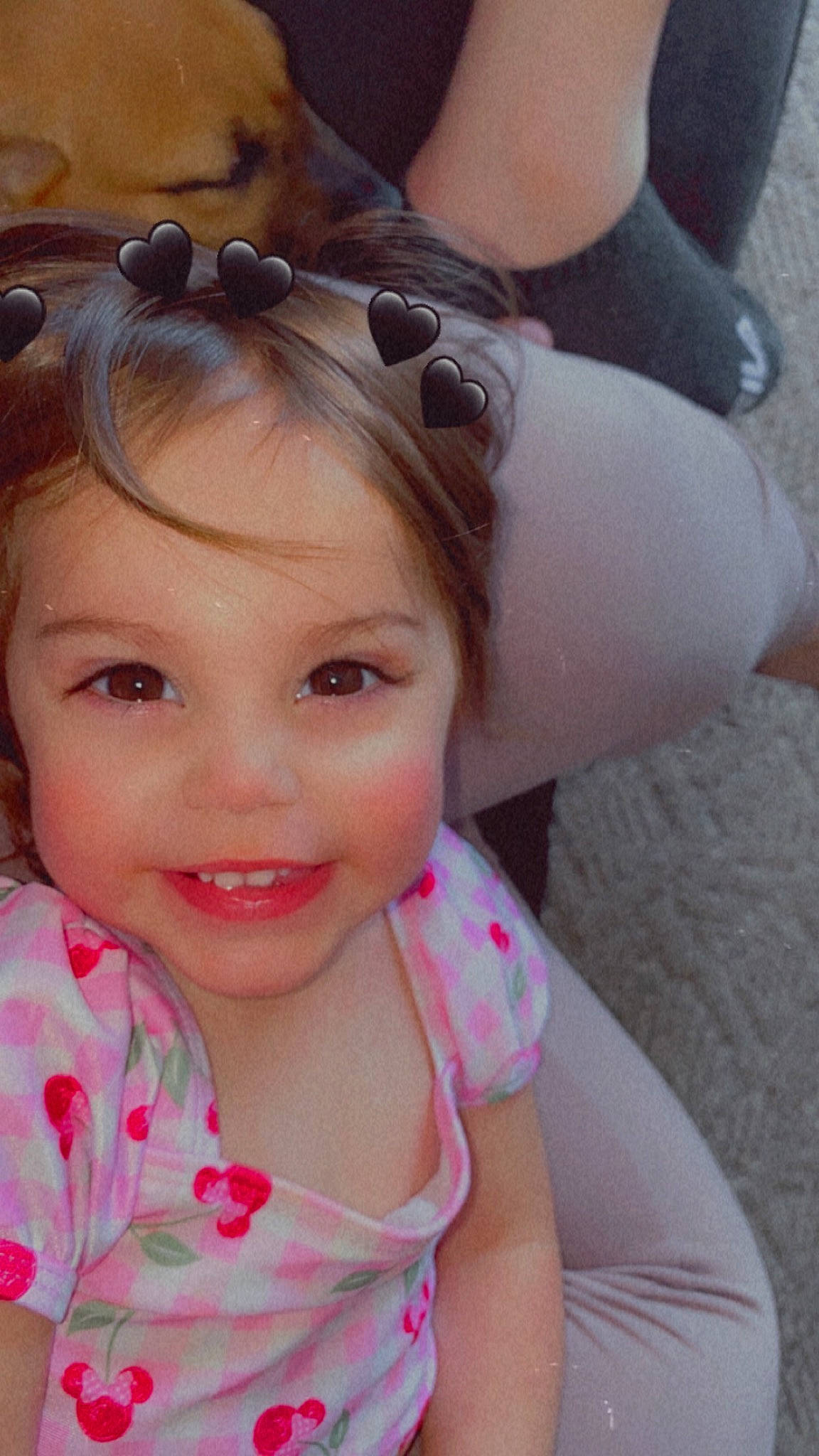 Amina is registered to the contest to win money with this photo: black_hair, cheek, eyebrow, eyelash, glasses, goggles, grass, happy, joy, lip, long_hair, mouth, nose, person, pink, plant, skin, smile, sunglasses, toddler