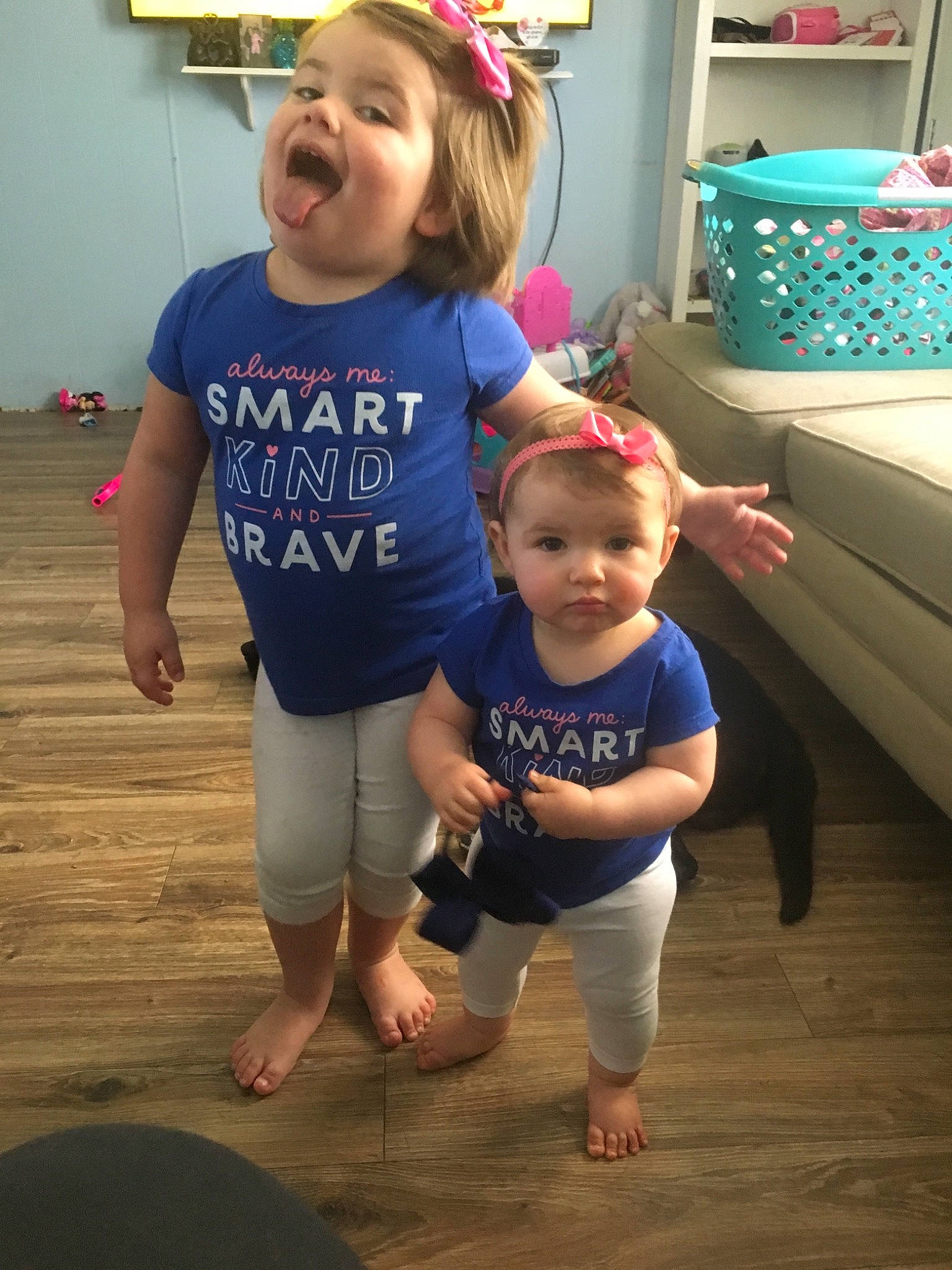 Haven is registered to the contest to win money with this photo: baby, child, costume, daughter, flooring, fun, person, play, smile, sportswear, standing, t_shirt, toddler