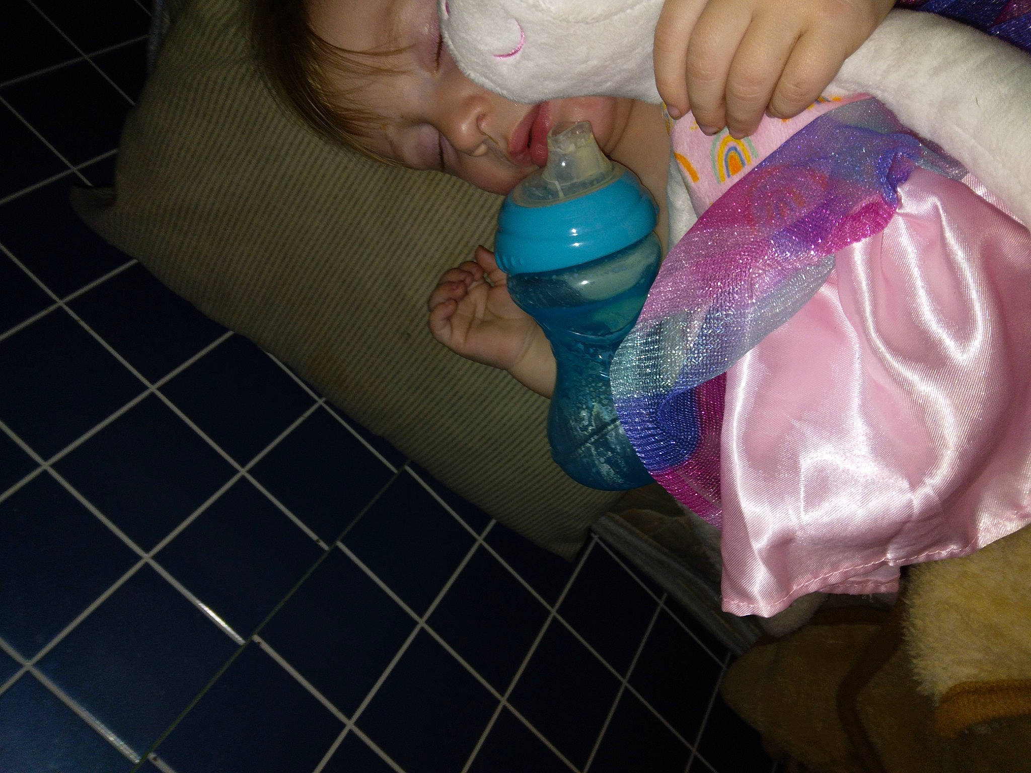 Marci is registered to the contest to win money with this photo: baby, baby_products, baby_toddler_clothing, child, electric_blue, finger, flooring, foot, hand, human_leg, magenta, nail, pattern, person, plaid, plastic, plastic_bottle, textile, thumb, toddler