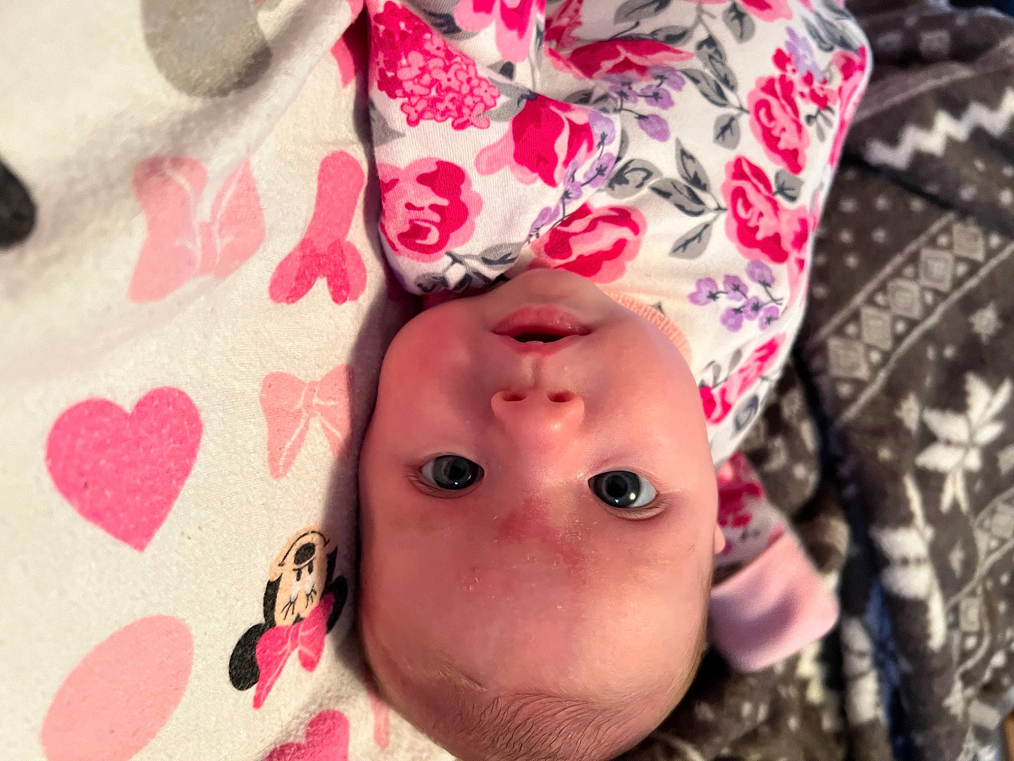 Raelynn is registered to the contest to win money with this photo: baby, cap, cheek, child, close_up, eyelash, happy, headgear, linens, lip, magenta, nose, pattern, person, petal, pink, plant, selfie, skin, textile