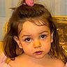Rose joined the competition — help win amazing prizes! child, toddler, face, portrait, brown_eyes, hair_accessory, pink_clothing, curly_hair, cute, indoor, young_child, person, closeup, expression, innocent, baby, eyelashes, soft_light, headshot, beauty